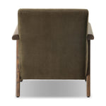 Contemporary outfitting of a vintage chair design offers easy comfort. Upholstered in velvety olive green, the wooden frame is finished in a vintage ash hue. Ideally placed as an accent chair or in pairs Amethyst Home provides interior design, new home construction design consulting, vintage area rugs, and lighting in the Winter Garden metro area.