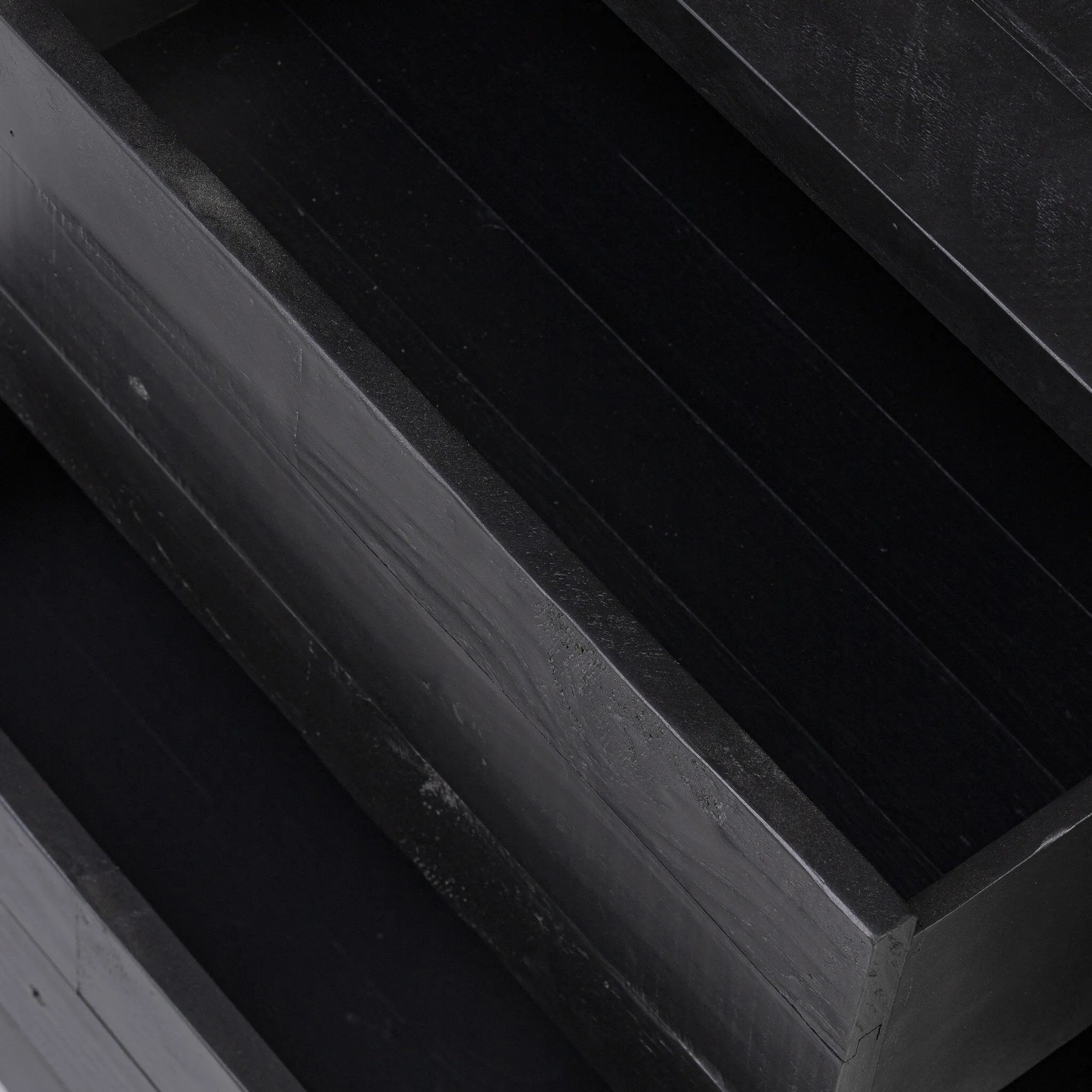 Beauty in simplicity. A clean cube of aged black-finished pine can be styled into a wide range of styles and spaces Amethyst Home provides interior design, new home construction design consulting, vintage area rugs, and lighting in the Newport Beach metro area.