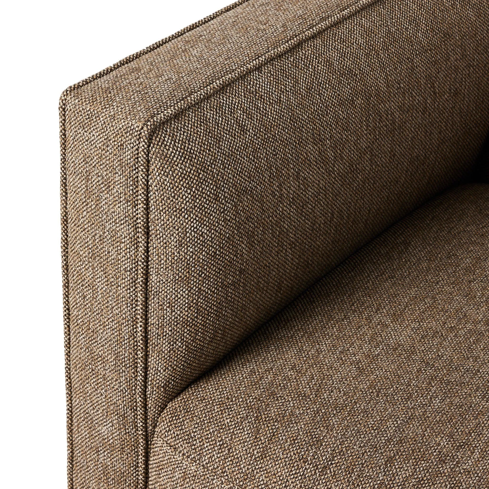 Featuring Phillip Delta Tweed Swivel Chair by Four Hands at Amethyst Home. Experience the ultimate comfort and versatility with the Phillip Delta Tweed Swivel Chair. Perfect for any workspace, this chair allows for easy movement and rotation, promoting better posture and reducing strain. With its sleek design and durable construction, this chair is a must. Amethyst Home provides interior design, new home construction design consulting, vintage area rugs, and lighting in the Kansas City metro area.