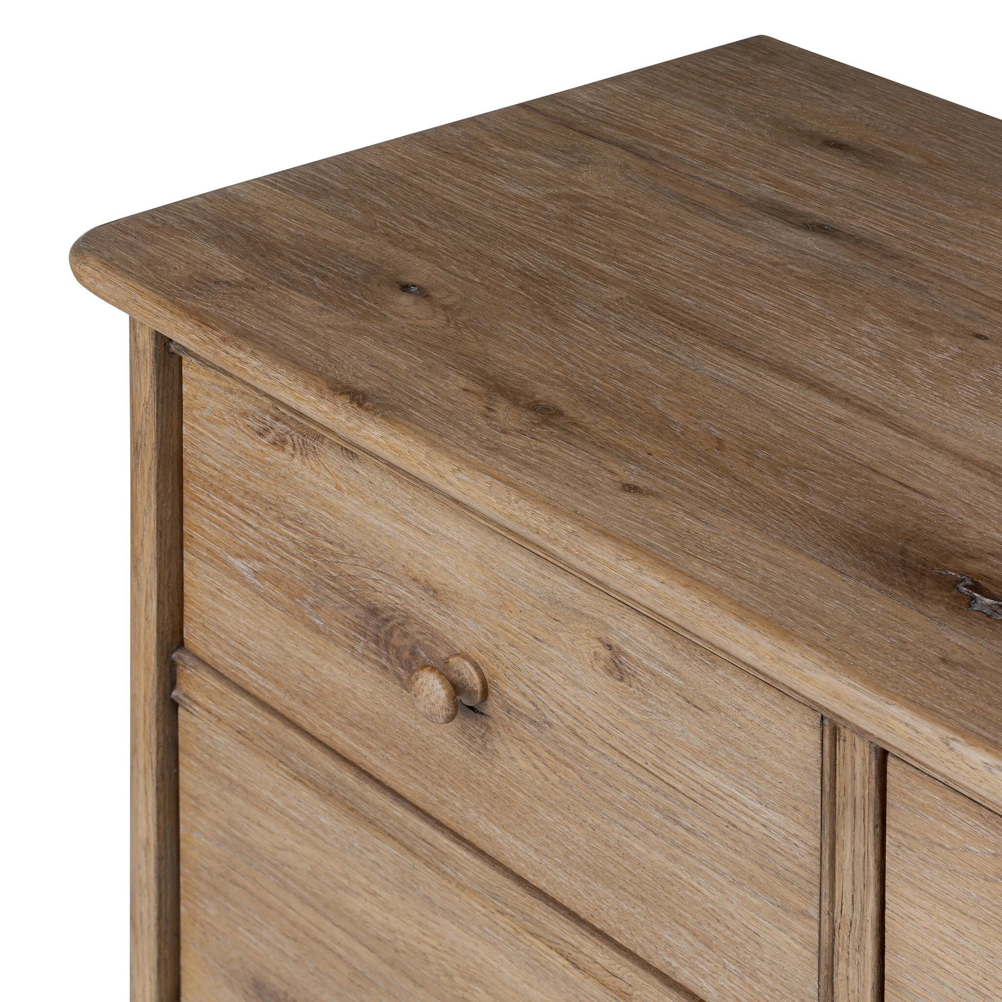 A classic chest stores in everlasting style. Crafted with heavy weathered oak with natural cracks and graining, the front has beading around the drawers for an heirloom appeal. It's finished in a tonal brown, with turned wood hardware Amethyst Home provides interior design, new home construction design consulting, vintage area rugs, and lighting in the Calabasas metro area.