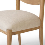 Featuring Piran Essence Natural Dining Chair by Four Hands at Amethyst Home. A celebration of simplicity. Natural nettlewood frames a comfortable linen-blend seat, while a subtle arc at the backrest's base softens clean, tapered lines. Performance fabrics are specially created to withstand spills, stains, high traffic and wear, ensuring long-term comfort an. Amethyst Home provides interior design, new home construction design consulting, vintage area rugs, and lighting in the Park City metro area.