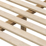 Rounded, chunky dowel legs in an amber oak finish frame the tan top-grain leather headboard of this simple-but-striking bed frame Amethyst Home provides interior design, new home construction design consulting, vintage area rugs, and lighting in the Los Angeles metro area.