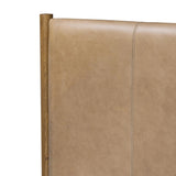 Rounded, chunky dowel legs in an amber oak finish frame the tan top-grain leather headboard of this simple-but-striking bed frame Amethyst Home provides interior design, new home construction design consulting, vintage area rugs, and lighting in the Winter Garden metro area.