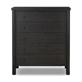 Create storage space in the bedroom with a five-drawer dresser of ebony-finished oak. Chunky dowel legs support a tall silhouette and overhang top, all finished out with simple gunmetal hardware Amethyst Home provides interior design, new home construction design consulting, vintage area rugs, and lighting in the Omaha metro area.