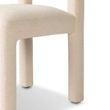 Fit for modern dining, this clean-styled chair is fully upholstered in a specialized performance fabric. An open back connects down to the cylindrical legs. Slight scale and squared off shape are great for smaller dining areas. Amethyst Home provides interior design, new home construction design consulting, vintage area rugs, and lighting in the Charlotte metro area.