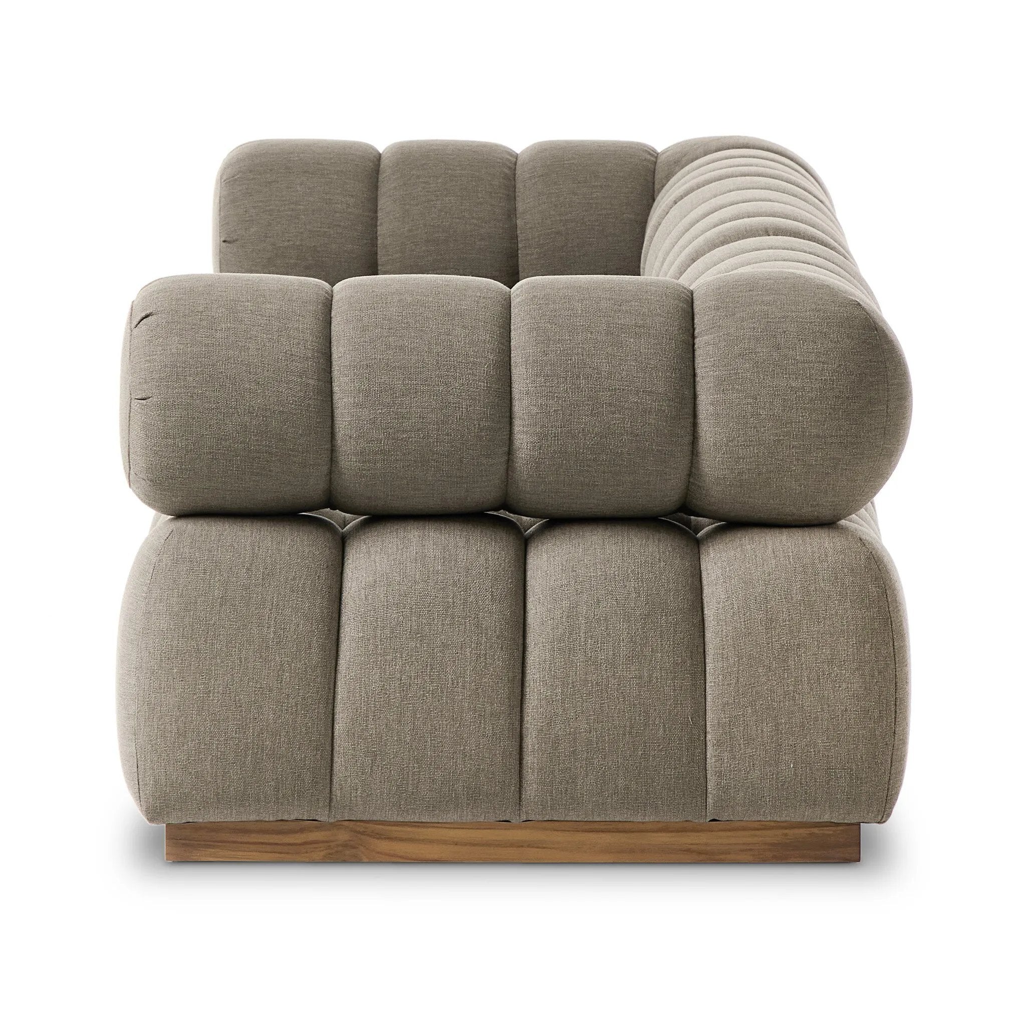 Featuring Roma Alessi Fawn Outdoor 3-Piece Sectional by Four Hands at Amethyst Home. A modern take on mid-century Italian design, soft volume and exaggerated proportions fuse for a sculpted look and playful feel. Atop a plinth-style teak base, outdoor-friendly three-piece sectional with ottoman features dramatic tufting for a padded sit, indoors and out. Cover . Amethyst Home provides interior design, new home construction design consulting, vintage area rugs, and lighting in the Omaha metro area.