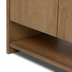 Resawn warm oak gives this sideboard's simple paneled design its standout striations. The paneled frame has a gallery top, and the bottom shelf provides open storage Amethyst Home provides interior design, new home construction design consulting, vintage area rugs, and lighting in the Washington metro area.