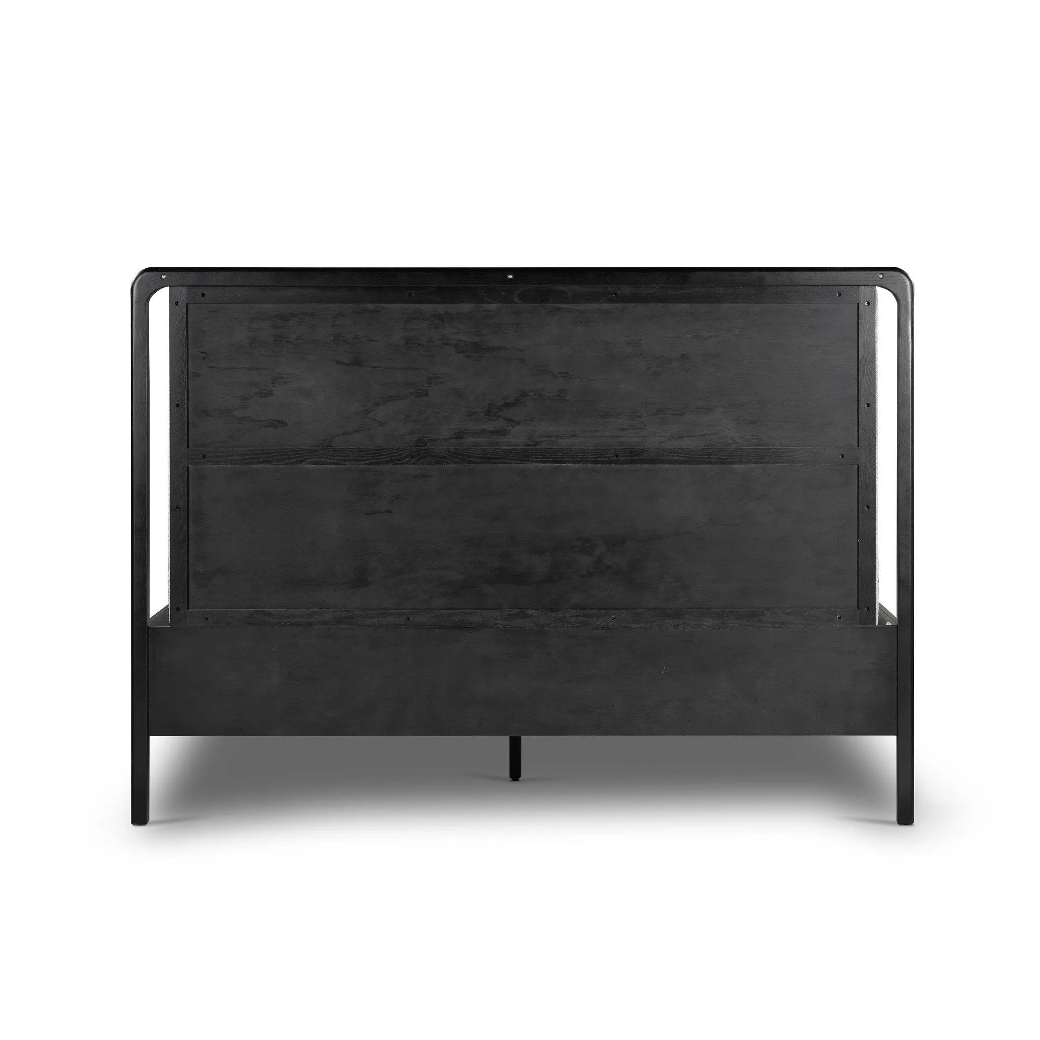 Ebony-finished oak frames a sling-style headboard made from top-grain leather, with subtly rounded edges and metal dowel detailing Amethyst Home provides interior design, new home construction design consulting, vintage area rugs, and lighting in the Seattle metro area.