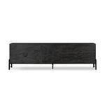 Featuring Rosedale Ebony Oak Veneer Media Console by Four Hands at Amethyst Home. This Rosedale Ebony Oak Veneer Media Console is the perfect addition to any media room or living space. Made with high-quality materials and a sleek design, this media console provides ample storage for all of your media devices. With its ebony oak veneer finish, it is both styli. Amethyst Home provides interior design, new home construction design consulting, vintage area rugs, and lighting in the Boston metro area.
