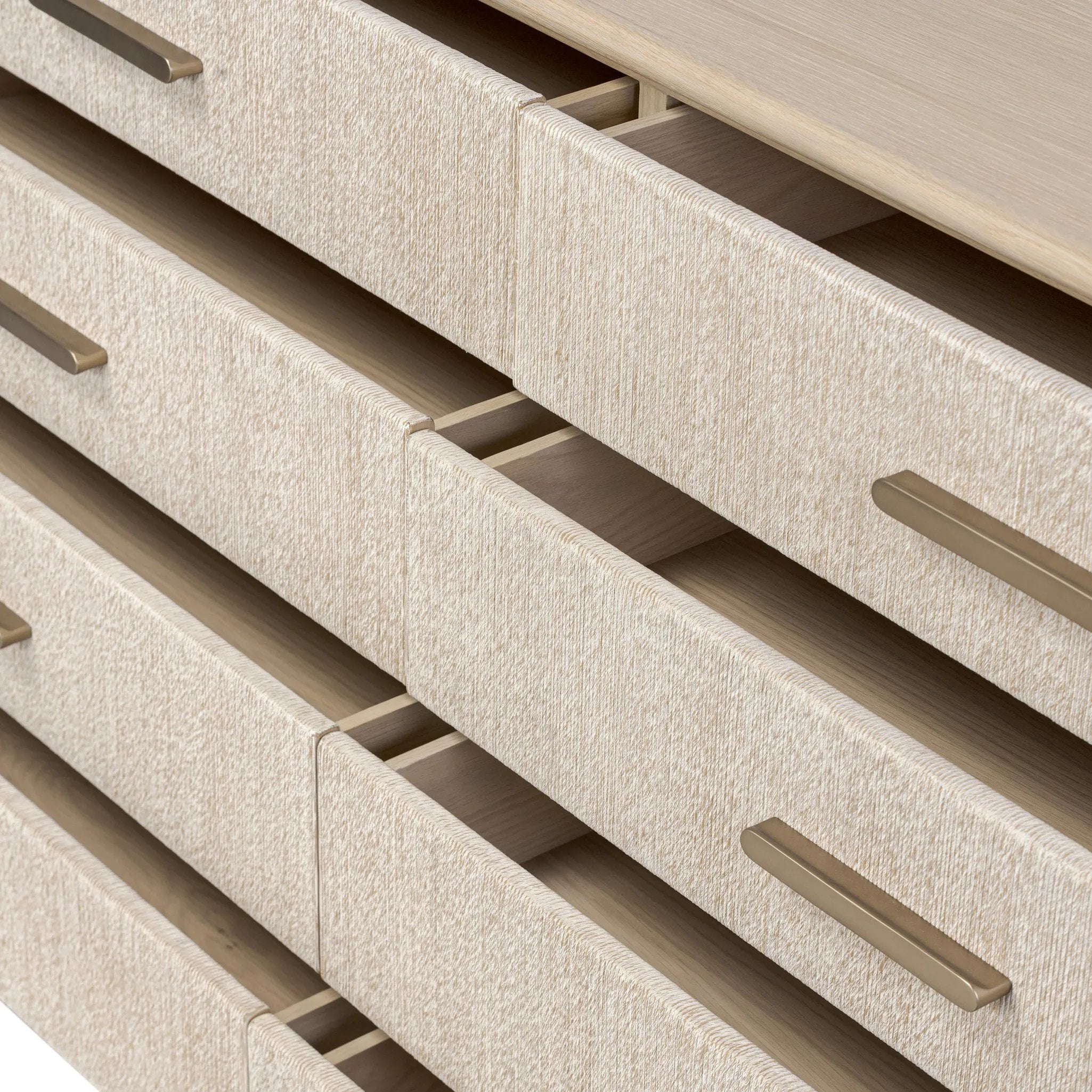 Elevate your bedroom styling with a storage-driven dresser of light, natural oak. A smooth top pairs with eight spacious drawers covered with woven paper cord. The result: a clean, Scandinavian-inspired look that will work into your collection beautifully Amethyst Home provides interior design, new home construction design consulting, vintage area rugs, and lighting in the Monterey metro area.