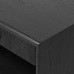 Elevate your bedside storage with a nightstand of black-finished oak. A smooth top pairs with a single drawer front of woven paper cord for a dark, rich look that will work into your bedroom collection beautifully Amethyst Home provides interior design, new home construction design consulting, vintage area rugs, and lighting in the Houston metro area.