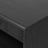 Elevate your bedside storage with a nightstand of black-finished oak. A smooth top pairs with a single drawer front of woven paper cord for a dark, rich look that will work into your bedroom collection beautifully Amethyst Home provides interior design, new home construction design consulting, vintage area rugs, and lighting in the Houston metro area.