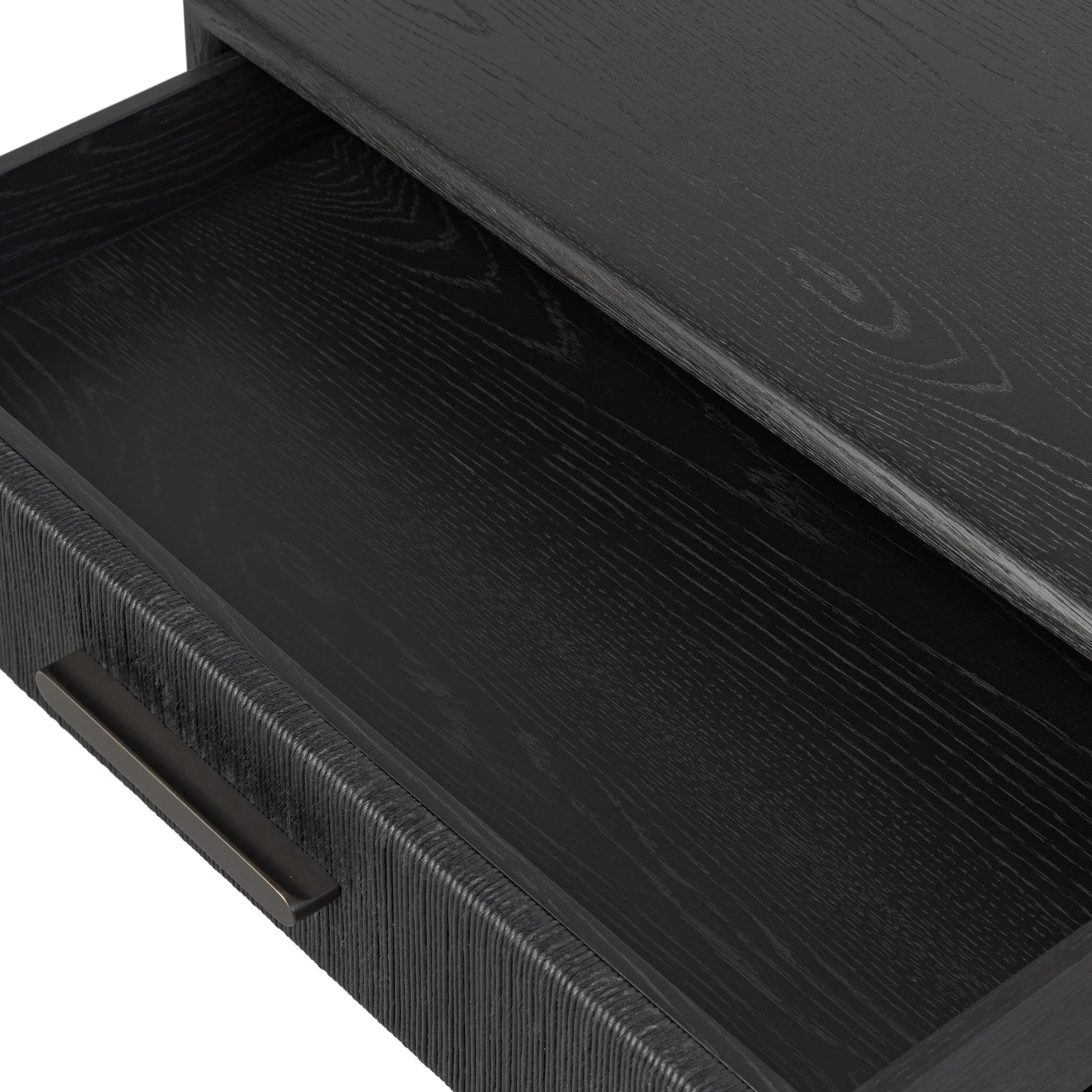 Elevate your bedside storage with a nightstand of black-finished oak. A smooth top pairs with a single drawer front of woven paper cord for a dark, rich look that will work into your bedroom collection beautifully Amethyst Home provides interior design, new home construction design consulting, vintage area rugs, and lighting in the Kansas City metro area.