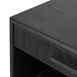 Elevate your bedside storage with a nightstand of black-finished oak. A smooth top pairs with a single drawer front of woven paper cord for a dark, rich look that will work into your bedroom collection beautifully Amethyst Home provides interior design, new home construction design consulting, vintage area rugs, and lighting in the Winter Garden metro area.