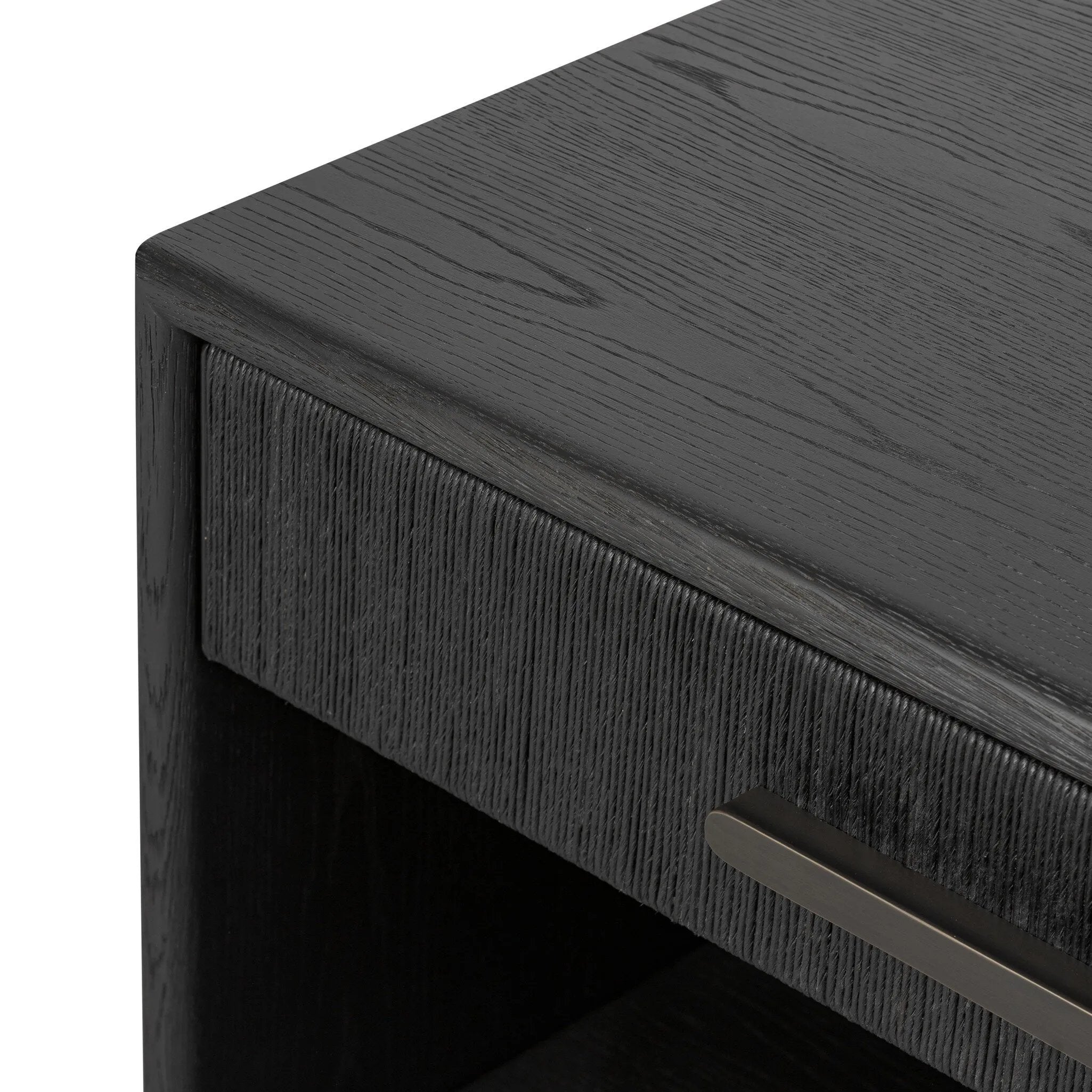 Elevate your bedside storage with a nightstand of black-finished oak. A smooth top pairs with a single drawer front of woven paper cord for a dark, rich look that will work into your bedroom collection beautifully Amethyst Home provides interior design, new home construction design consulting, vintage area rugs, and lighting in the Winter Garden metro area.