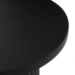 Inspired by décor in the majestic palaces of Jaipur, a conversation-starting end table is made from mixed reclaimed woods, with a rounded top and base with vertical reeding Amethyst Home provides interior design, new home construction design consulting, vintage area rugs, and lighting in the Calabasas metro area.