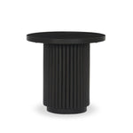 Inspired by décor in the majestic palaces of Jaipur, a conversation-starting end table is made from mixed reclaimed woods, with a rounded top and base with vertical reeding Amethyst Home provides interior design, new home construction design consulting, vintage area rugs, and lighting in the Washington metro area.