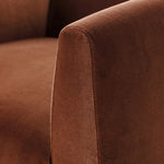 Velvety upholstery in a deep auburn hue covers clean-angled, deeply cushioned seating with a 360-degree swivel base for relaxed lounging and conversation Amethyst Home provides interior design, new home construction design consulting, vintage area rugs, and lighting in the Newport Beach metro area.