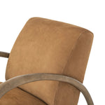 Featuring Sandro Nubuck Cognac Chair by Four Hands at Amethyst Home. This versatile accent chair is upholstered in a faux Mongolian shearling with a textural high pile. A contrasting, chunky parawood frame hugs the seat and is wire-brushed for a warm, vintage feel.Overall Dimensions: 29.50"w x 41.00"d x 32.00"hWeight : 45.19 lbsMaterials : Top Grain Leather,. Amethyst Home provides interior design, new home construction design consulting, vintage area rugs, and lighting in the Monterey metro area.