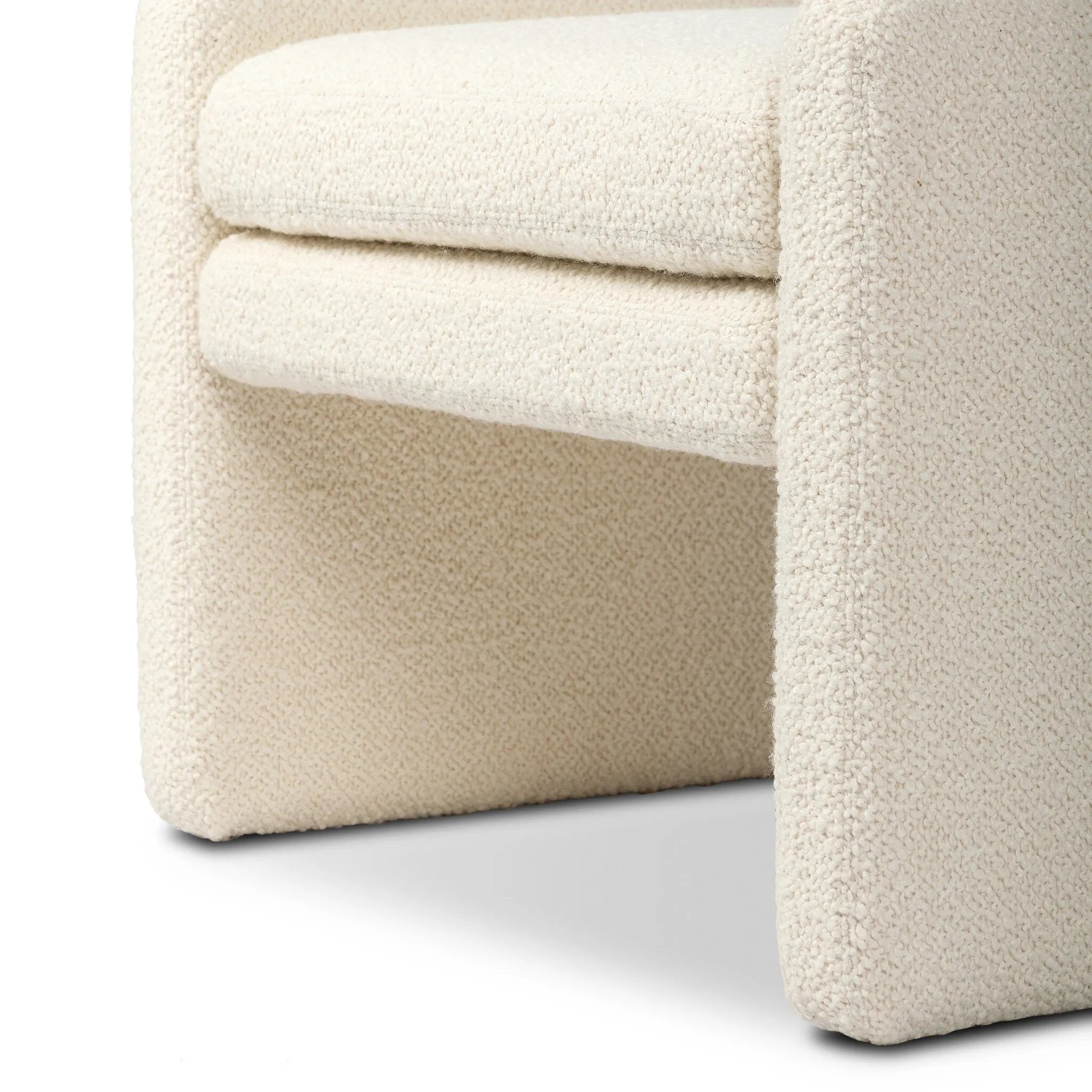 A traditional wool-blend fabric in cream covers this versatile ottoman for an easy fit in any room Amethyst Home provides interior design, new home construction design consulting, vintage area rugs, and lighting in the Nashville metro area.