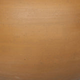 Inspired by vintage vessels, a stout table lamp bears the unique markings of natural terracotta. Topped with a neutral linen shade for texture and contrast Amethyst Home provides interior design, new home construction design consulting, vintage area rugs, and lighting in the Seattle metro area.