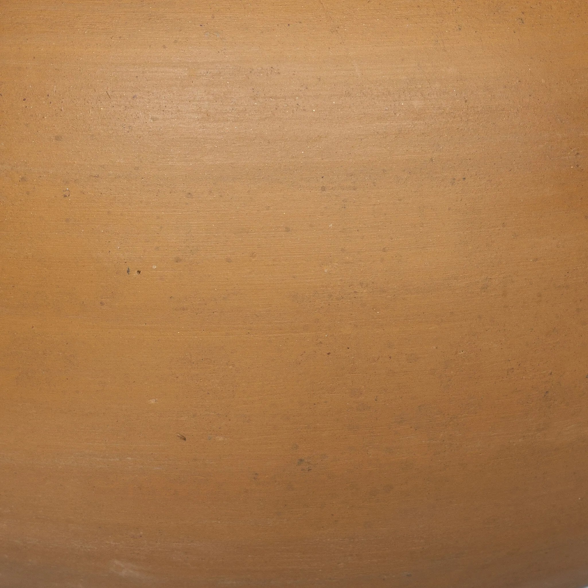 Inspired by vintage vessels, a stout table lamp bears the unique markings of natural terracotta. Topped with a neutral linen shade for texture and contrast Amethyst Home provides interior design, new home construction design consulting, vintage area rugs, and lighting in the Seattle metro area.