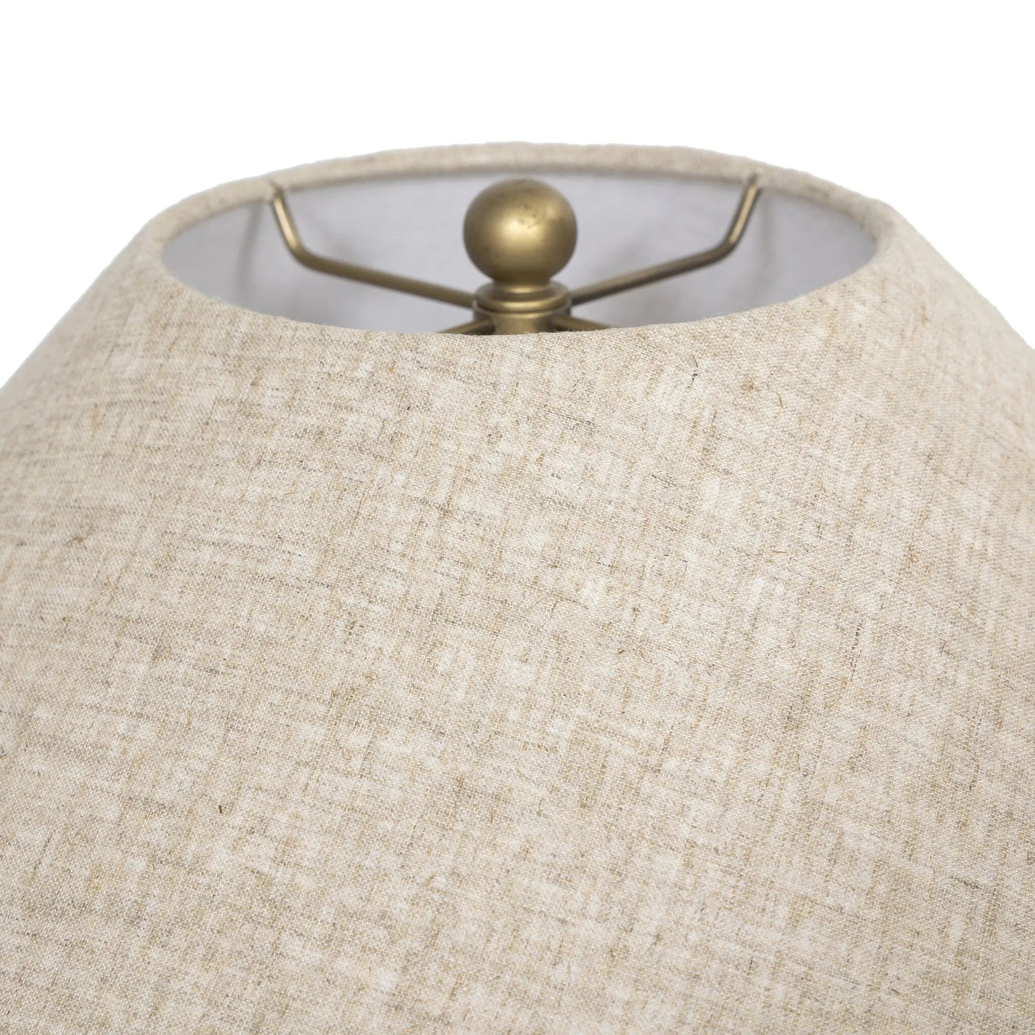 Inspired by vintage vessels, a stout table lamp bears the unique markings of natural terracotta. Topped with a neutral linen shade for texture and contrast Amethyst Home provides interior design, new home construction design consulting, vintage area rugs, and lighting in the Washington metro area.