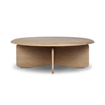 Featuring Surie Sandy Oak Resawn Coffee Table by Four Hands at Amethyst Home. A shape-driven piece inspired by clean Nordic design. Softened edges and a curved base craft a sense of flow, accentuated by cathedral grain oak with beautiful natural warmth. Overall Dimensions: 48.00"w x 48.00"d x 16.50"h. Amethyst Home provides interior design, new home construction design consulting, vintage area rugs, and lighting in the Des Moines metro area.