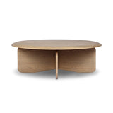 Featuring Surie Sandy Oak Resawn Coffee Table by Four Hands at Amethyst Home. A shape-driven piece inspired by clean Nordic design. Softened edges and a curved base craft a sense of flow, accentuated by cathedral grain oak with beautiful natural warmth. Overall Dimensions: 48.00"w x 48.00"d x 16.50"h. Amethyst Home provides interior design, new home construction design consulting, vintage area rugs, and lighting in the Des Moines metro area.