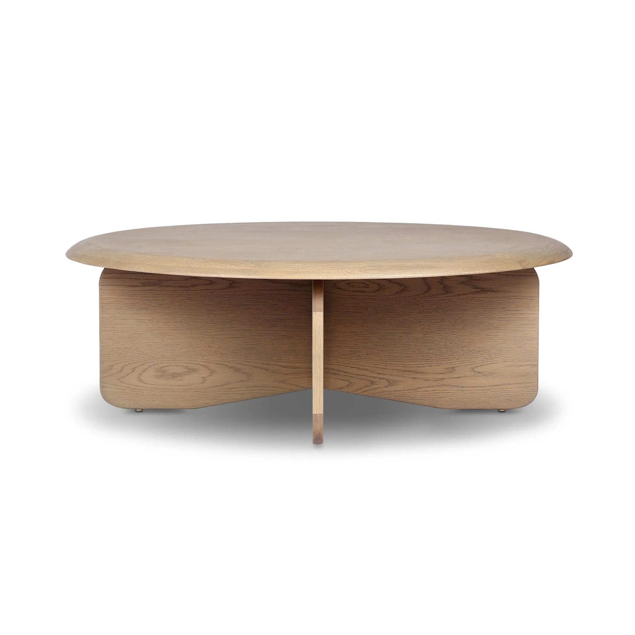 Featuring Surie Sandy Oak Resawn Coffee Table by Four Hands at Amethyst Home. A shape-driven piece inspired by clean Nordic design. Softened edges and a curved base craft a sense of flow, accentuated by cathedral grain oak with beautiful natural warmth. Overall Dimensions: 48.00"w x 48.00"d x 16.50"h. Amethyst Home provides interior design, new home construction design consulting, vintage area rugs, and lighting in the Scottsdale metro area.