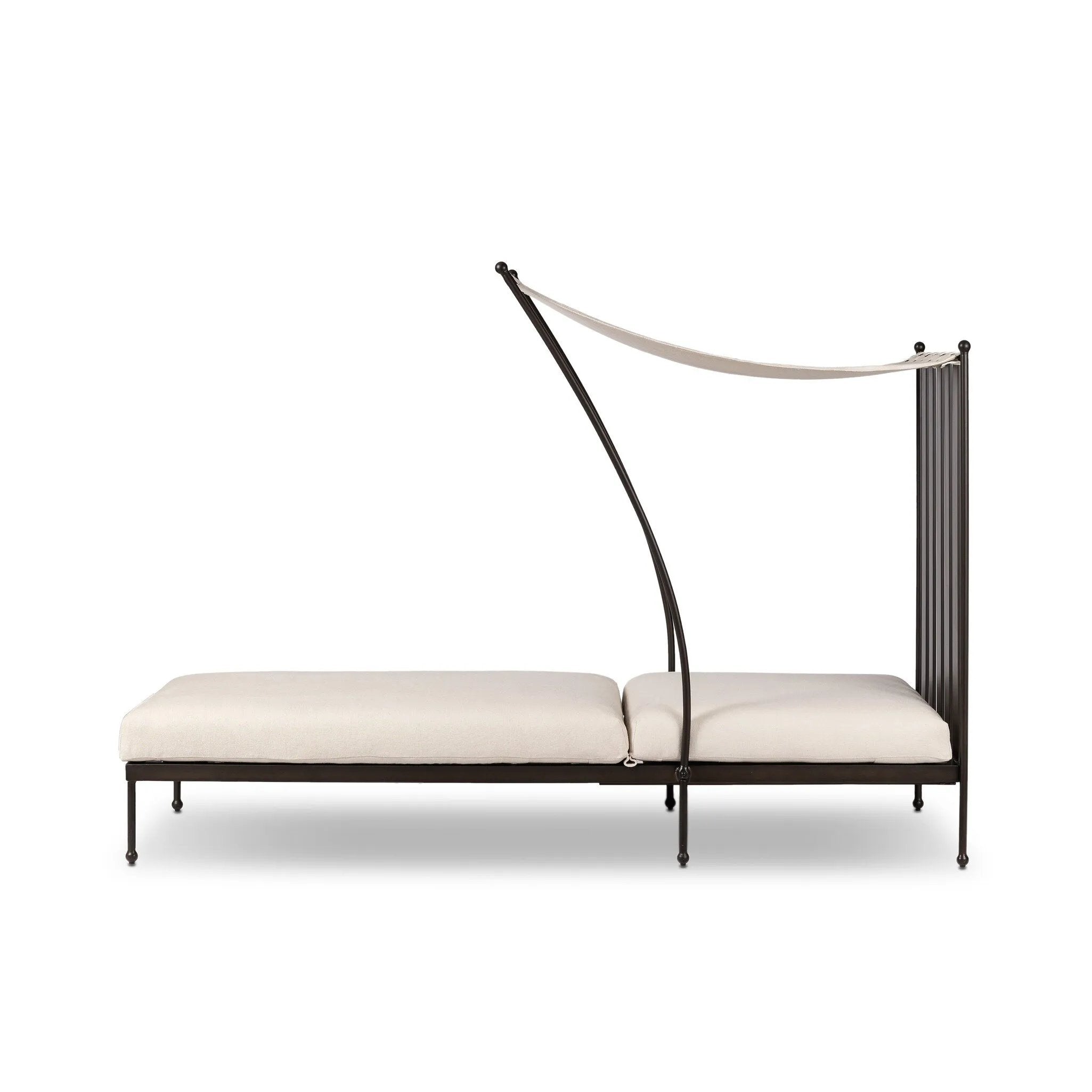 Statement-making comfort. This outdoor chaise brings a modern, French Deco-inspired look with bold color contrast to the patio. High back vertical slats pair with the removable canopy and small finial details for a unique take on traditional. Cover or store indoors during inclement weather and when not in use Amethyst Home provides interior design, new home construction design consulting, vintage area rugs, and lighting in the Calabasas metro area.