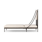 Statement-making comfort. This outdoor chaise brings a modern, French Deco-inspired look with bold color contrast to the patio. High back vertical slats pair with the removable canopy and small finial details for a unique take on traditional. Cover or store indoors during inclement weather and when not in use Amethyst Home provides interior design, new home construction design consulting, vintage area rugs, and lighting in the Scottsdale metro area.
