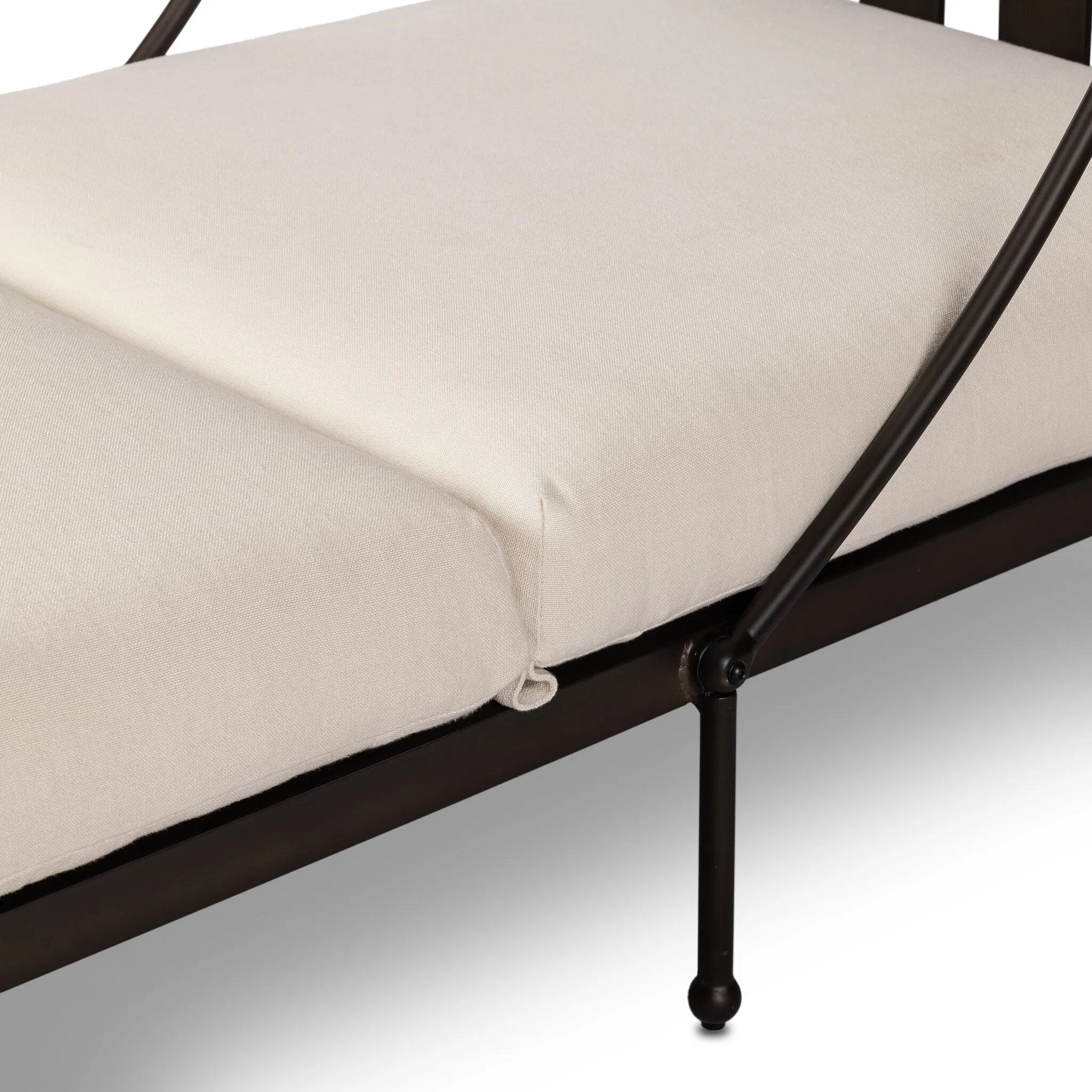 Statement-making comfort. This outdoor chaise brings a modern, French Deco-inspired look with bold color contrast to the patio. High back vertical slats pair with the removable canopy and small finial details for a unique take on traditional. Cover or store indoors during inclement weather and when not in use Amethyst Home provides interior design, new home construction design consulting, vintage area rugs, and lighting in the Tampa metro area.