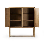 Featuring Tamara Worn Oak Cabinet by Four Hands at Amethyst Home. Worn oak cabinetry with paneled doors, all atop an elevated stand. With natural cracks for character, this piece can be styled just about anywhere, bringing with it bonus storage and vintage charm.
Overall Dimensions: 19.25" L x 60.5 " W x 69.5" H
Collection: CordellaColors: Worn Oak VeneerMate. Amethyst Home provides interior design, new home construction design consulting, vintage area rugs, and lighting in the Houston metro area.