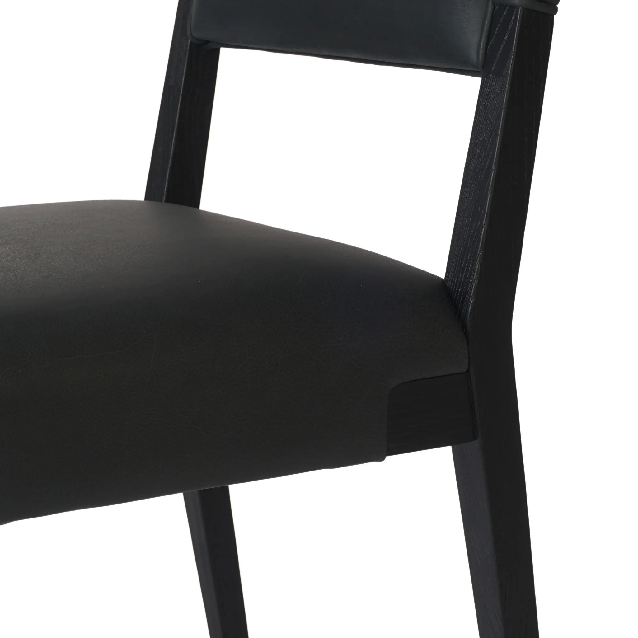 Featuring Tamari Brickhouse Black Dining Chair by Four Hands at Amethyst Home. Indulge in the luxurious experience of dining with our Tamari Brickhouse Black Dining Chair. With its sleek and sophisticated design, this chair is sure to elevate any dining space. Comfortable and elegant, it's the perfect addition to your upscale lifestyle.
Overall Dimensions: 19.. Amethyst Home provides interior design, new home construction design consulting, vintage area rugs, and lighting in the Boston metro area.