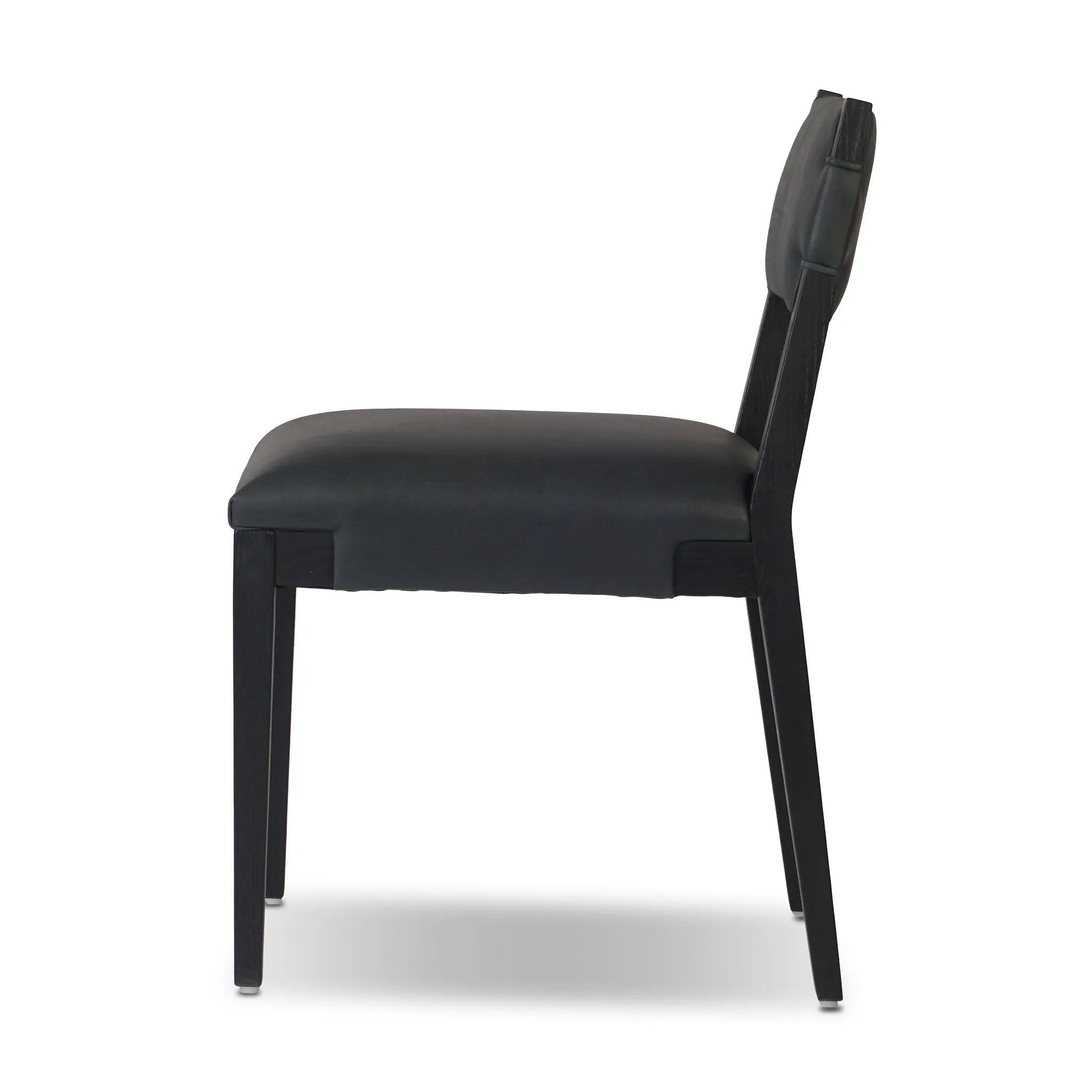 Featuring Tamari Brickhouse Black Dining Chair by Four Hands at Amethyst Home. Indulge in the luxurious experience of dining with our Tamari Brickhouse Black Dining Chair. With its sleek and sophisticated design, this chair is sure to elevate any dining space. Comfortable and elegant, it's the perfect addition to your upscale lifestyle.
Overall Dimensions:. Amethyst Home provides interior design, new home construction design consulting, vintage area rugs, and lighting in the Washington metro area.