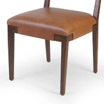 Featuring Tamari Sonoma Chestnut Dining Chair by Four Hands at Amethyst Home. Upgrade your dining experience with the Tamari Sonoma Chestnut Dining Chair. Made with high-quality materials, this chair provides comfortable seating while adding a touch of elegance to your dining room. Its sleek design and sturdy construction make it the perfect addition to any ho. Amethyst Home provides interior design, new home construction design consulting, vintage area rugs, and lighting in the Dallas metro area.