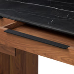 Design your home office with hallmark features inspired by soft Brutalism. Made from solid walnut and poplar woods with a natural finish, the five-drawer executive desk is topped with a black marble top with half bullnose edging for smooth contours. High-quality hardware is crafted from black iron Amethyst Home provides interior design, new home construction design consulting, vintage area rugs, and lighting in the Newport Beach metro area.