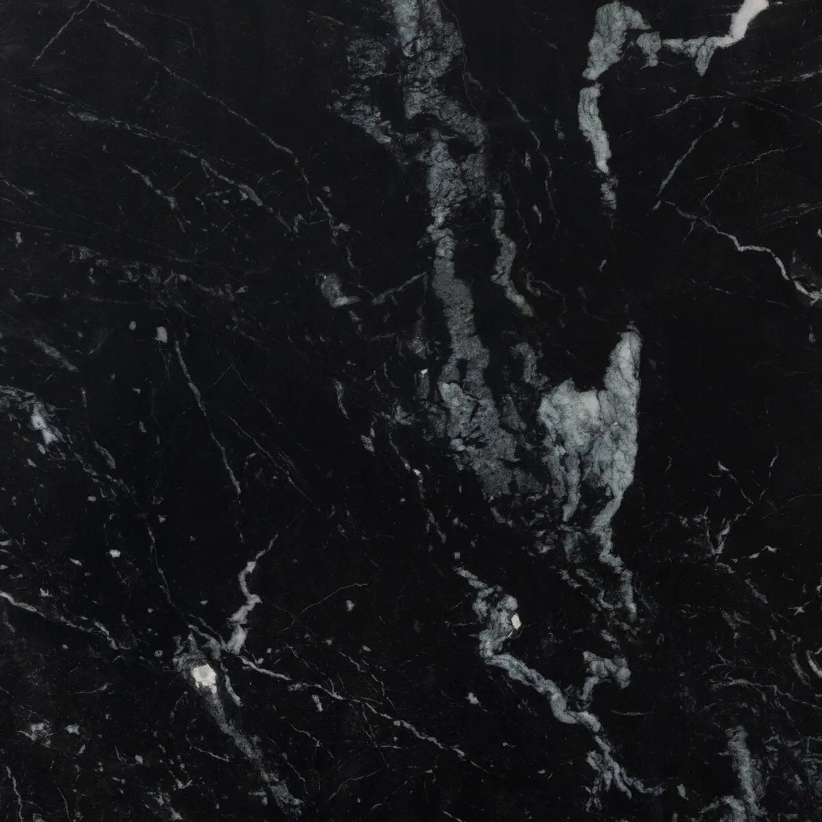 Featuring Terrell Black Marble End Table by Four Hands at Amethyst Home. Expertly crafted, the Terrell Black Marble End Table elevates any room with its sleek design and durable construction. The perfect addition to your living space, this end table offers both functionality and style. Made with high-quality marble, it provides a touch of elegance while b. Amethyst Home provides interior design, new home construction design consulting, vintage area rugs, and lighting in the Los Angeles metro area.