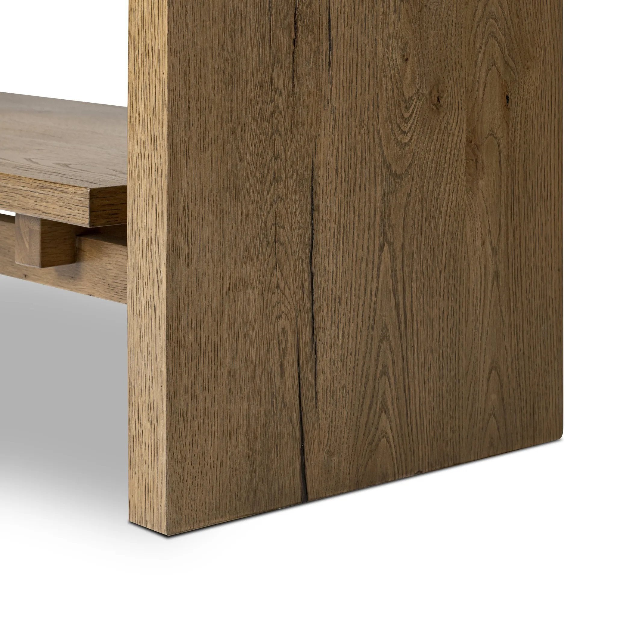 Featuring Theodore Rustic Amber Oak Veneer Bookcase by Four Hands at Amethyst Home. Wide and stately, with plenty of space for storage and display. A bookcase made from rustic amber-finished oak shapes a wide floating shelf design, with layered cross supports bringing an architectural feel to the office or living room.Overall Dimensions: 60.00"w x 18.00"d x . Amethyst Home provides interior design, new home construction design consulting, vintage area rugs, and lighting in the Portland metro area.