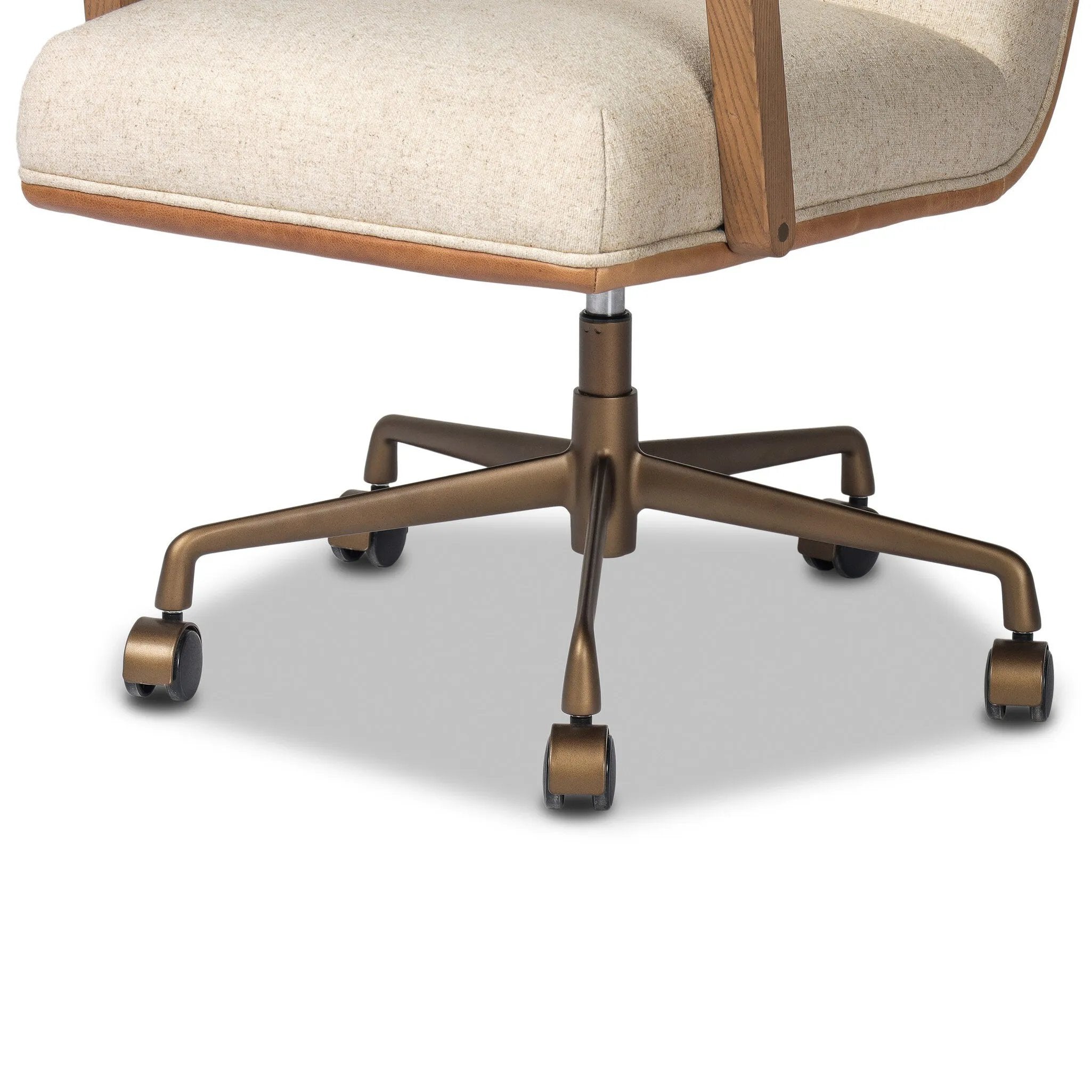 A classic silhouette is modernized with a cotton- and linen-blend performance fabric, then elevated with a top-grain leather back Amethyst Home provides interior design, new home construction design consulting, vintage area rugs, and lighting in the Los Angeles metro area.