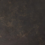 Made from distressed metal with a bronzed finish, an organically shaped end table features two tabletops, perfectly sized for your drink or favorite book Amethyst Home provides interior design, new home construction design consulting, vintage area rugs, and lighting in the Dallas metro area.