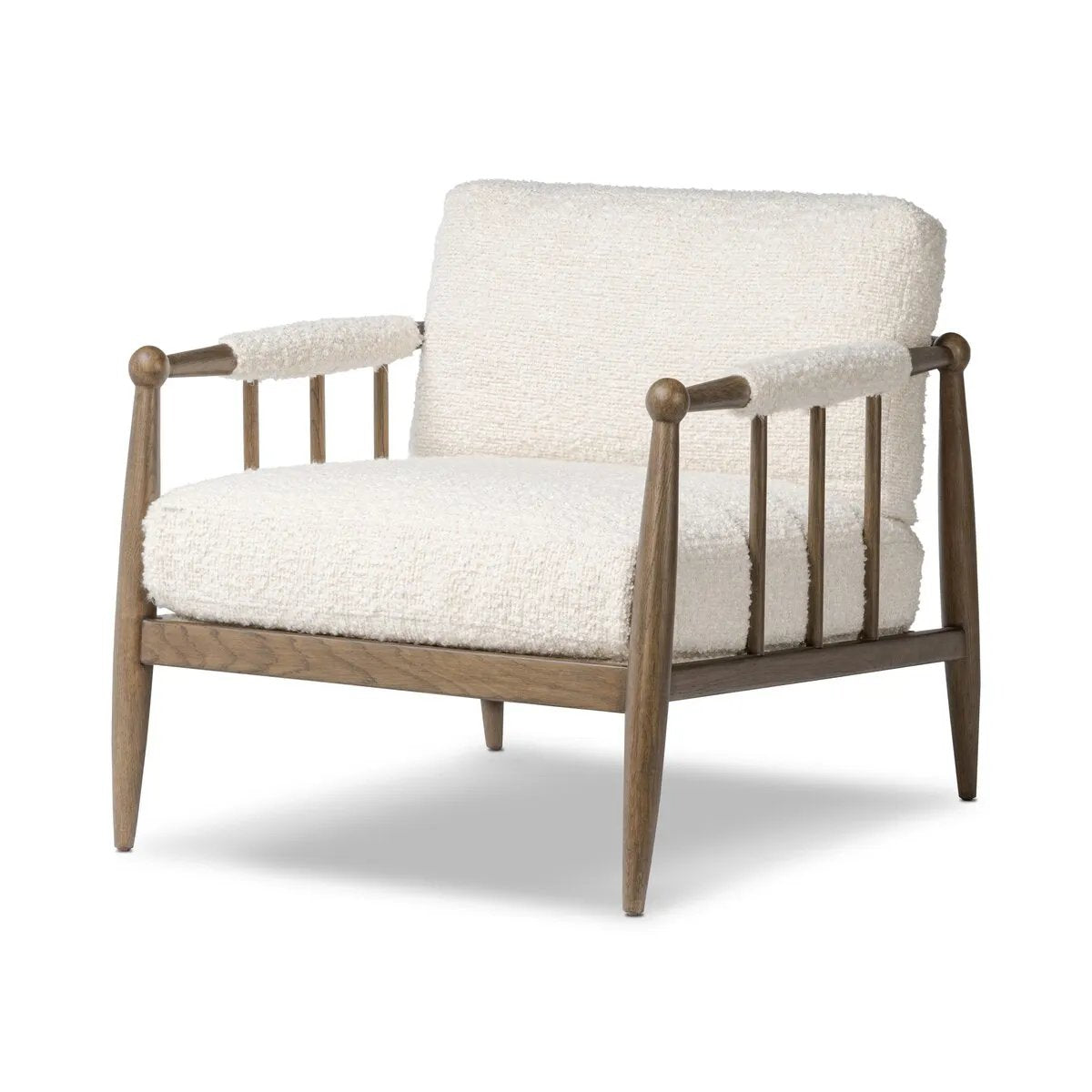 Featuring Warren Ivan Snow Chair by Four Hands at Amethyst Home. A classic silhouette through a contemporary lens. Framed in vintage oak, this accent chair features tapered legs, spindles along the arms and bauble details. Finished in Turkish-made upholstery with a heavy pile that blends brushed, pulled and boucle styles, it's woven into a subtle linear p. Amethyst Home provides interior design, new home construction design consulting, vintage area rugs, and lighting in the Kansas City metro area.