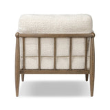 Featuring Warren Ivan Snow Chair by Four Hands at Amethyst Home. A classic silhouette through a contemporary lens. Framed in vintage oak, this accent chair features tapered legs, spindles along the arms and bauble details. Finished in Turkish-made upholstery with a heavy pile that blends brushed, pulled and boucle styles, it's woven into a subtle linear pat. Amethyst Home provides interior design, new home construction design consulting, vintage area rugs, and lighting in the Park City metro area.