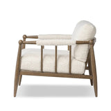 Featuring Warren Ivan Snow Chair by Four Hands at Amethyst Home. A classic silhouette through a contemporary lens. Framed in vintage oak, this accent chair features tapered legs, spindles along the arms and bauble details. Finished in Turkish-made upholstery with a heavy pile that blends brushed, pulled and boucle styles, it's woven into a subtle linear pattern. Amethyst Home provides interior design, new home construction design consulting, vintage area rugs, and lighting in the Tampa metro area.