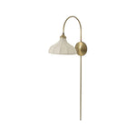Slim and curved, a swan-neck arm supports a bell-shaped linen shade with brass boning, updating a traditional lighting look. This plug-in sconce design brings warm illumination to any space while discreet cord management keeps the look polished. Ideal for crafting warm, inviting reading corners or bedside ambiance Amethyst Home provides interior design, new home construction design consulting, vintage area rugs, and lighting in the Washington metro area.