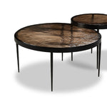 Featuring Yoko Smoked Brown Cast Glass Nesting Table by Four Hands at Amethyst Home. Smoky brown glass tops with slim, tapere