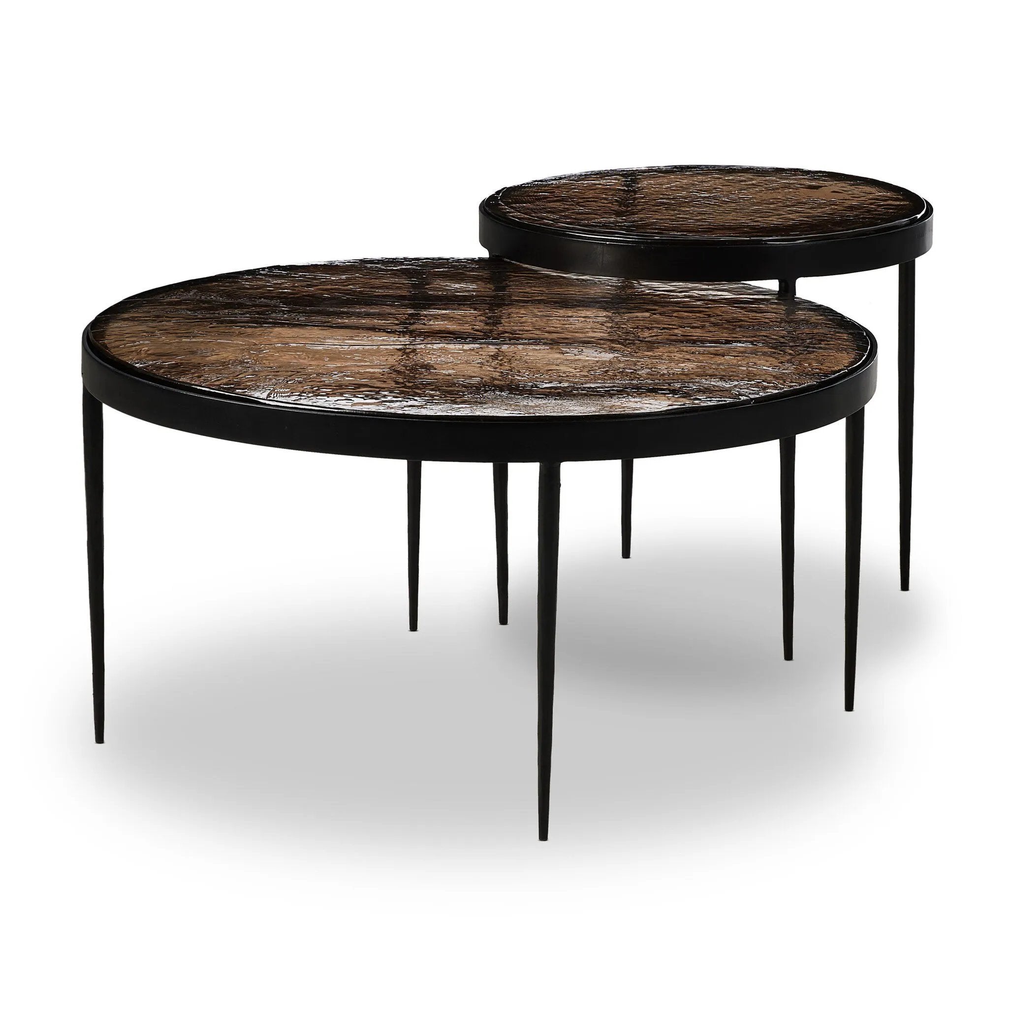 Featuring Yoko Smoked Brown Cast Glass Nesting Table by Four Hands at Amethyst Home. Smoky brown glass tops with slim, tapere