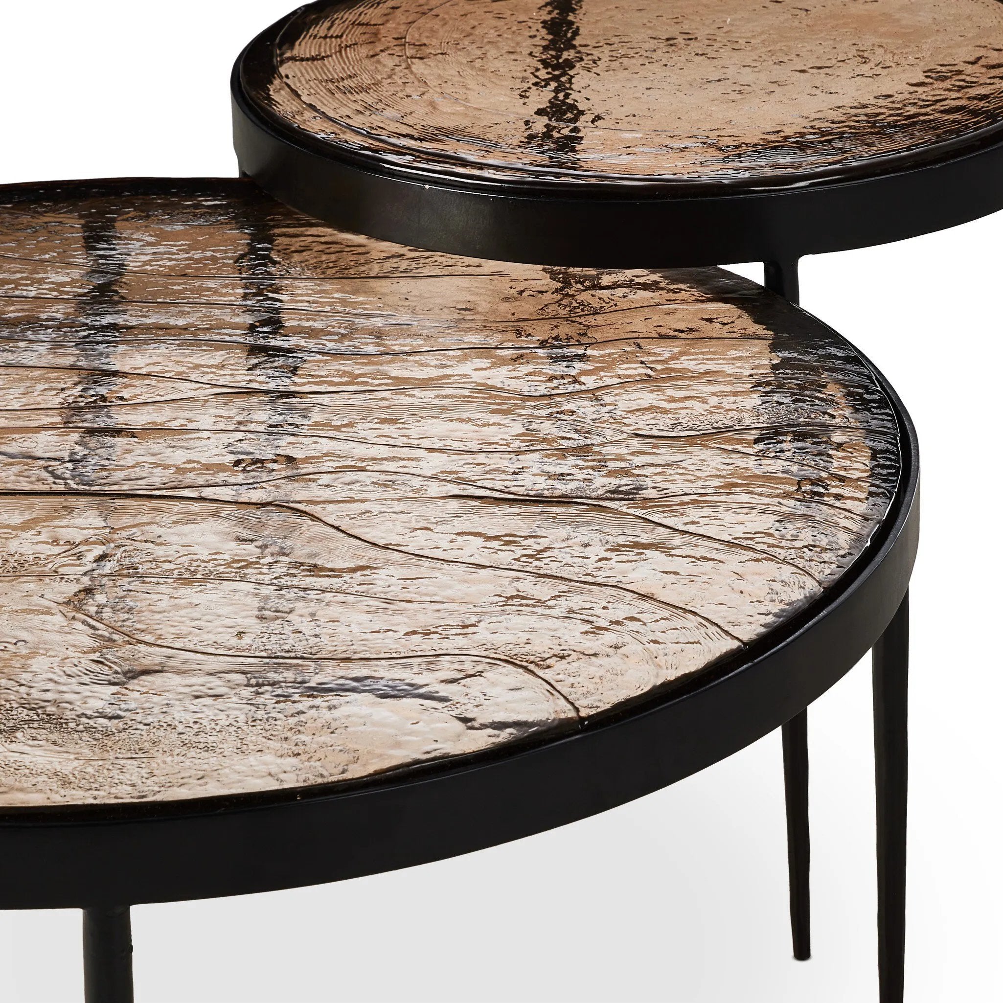 Featuring Yoko Smoked Brown Cast Glass Nesting Table by Four Hands at Amethyst Home. Smoky brown glass tops with slim, tapere