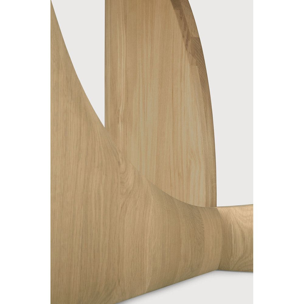 Featuring Geometric Oak Round Dining Table by Ethnicraft at Amethyst Home. In the Geometric collection, shapes intersect in unexpected ways, creating playful contrasts with light and shadow at every angle. Inspired by the bestselling side table, the round Geometric dining table makes a practical statement.Weight : 128 lbs Dimensions: 59.5" W x 59.5" L x 30" H. Amethyst Home provides interior design, new construction, custom furniture, and area rugs in the Washington metro area